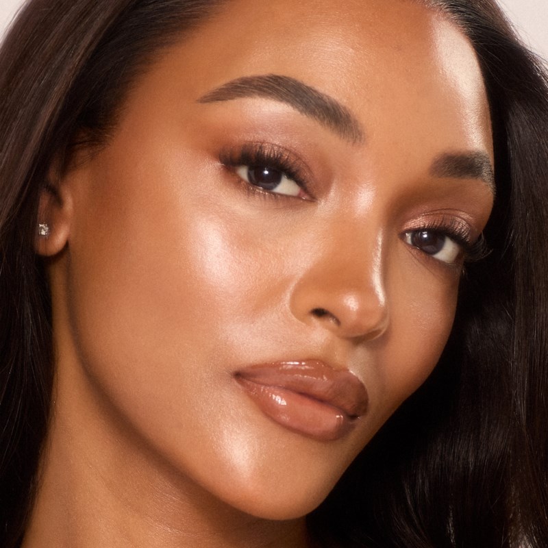 Unreal skin sheer glow tint 12 tan 32