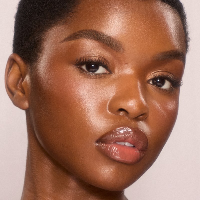 Unreal skin sheer glow tint 12 tan 14